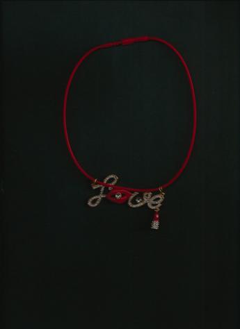 LOVE rhinestones, red lips, red lipstick pendant on a 12-inch red silkie necklace. (dark background)