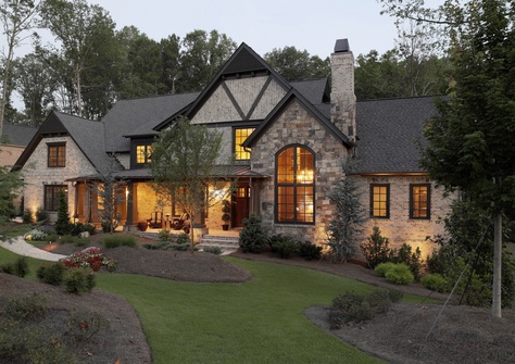 Classic Stone and Brick Exterior with 3 Car Garage