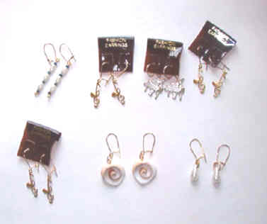 7 pairs earrings with flower case