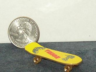 Miniature Dollhouse Brass Skateboard