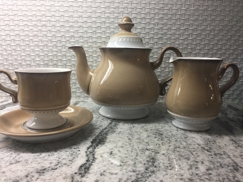 Teapot, cream and sugar