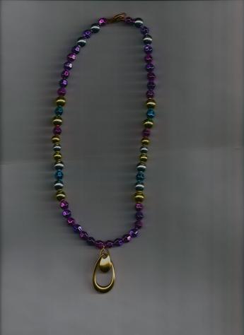 Eclectic? You decide! Very pretty & stylish multi-colored beaded 12-inch pendant necklace. EYE-CATCHINGLY SEXY!